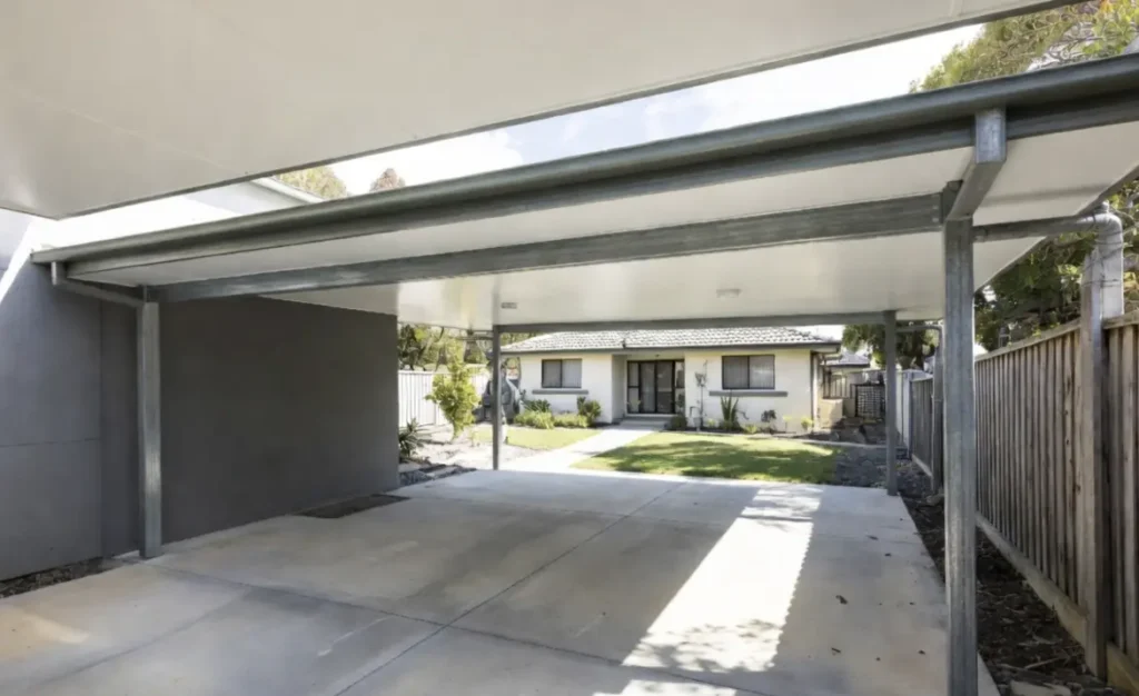 Carport built within 900mm of allotment boundary – Performance Solution case study